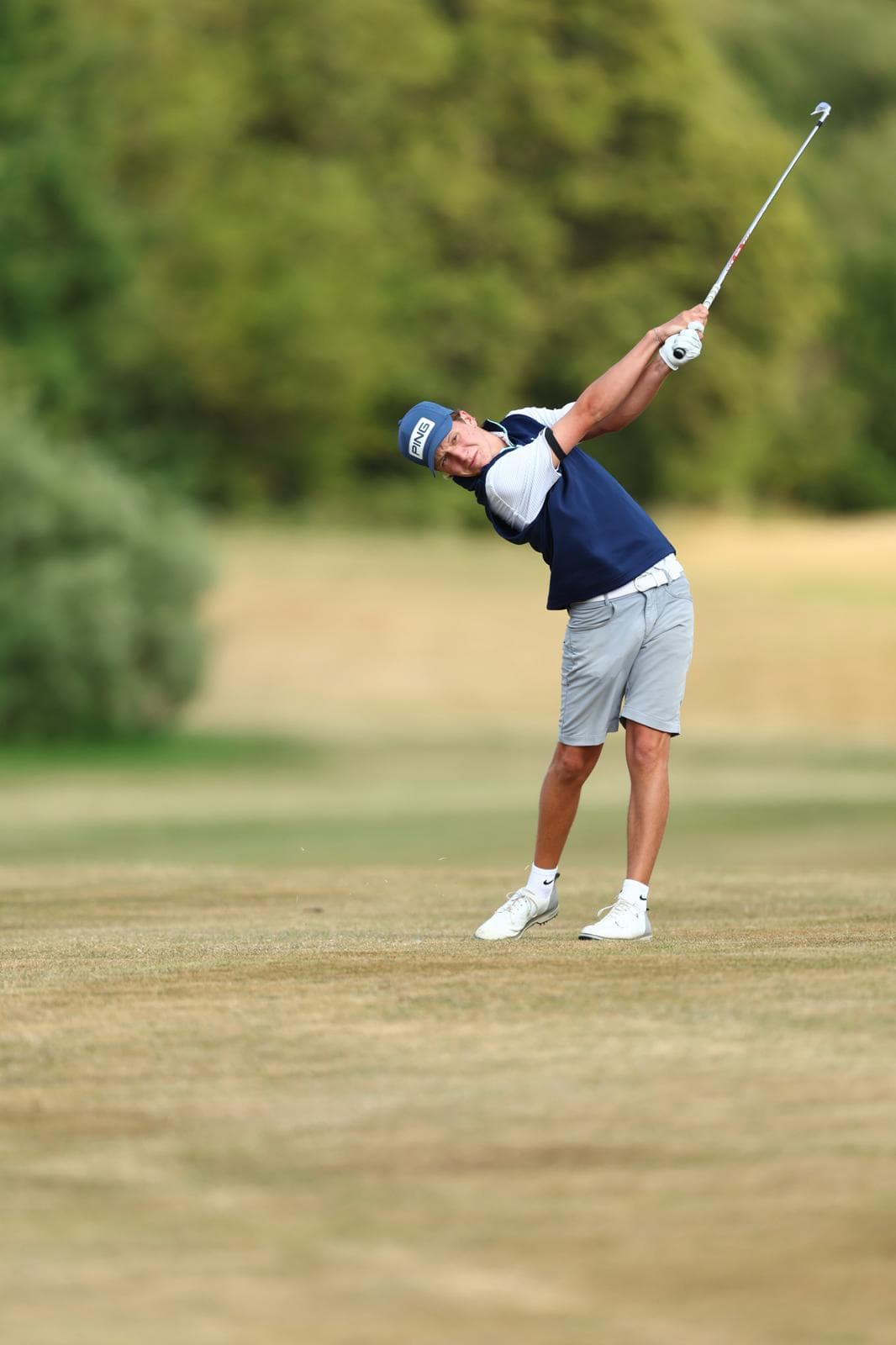 Seb Creaser, fairway iron follow-through